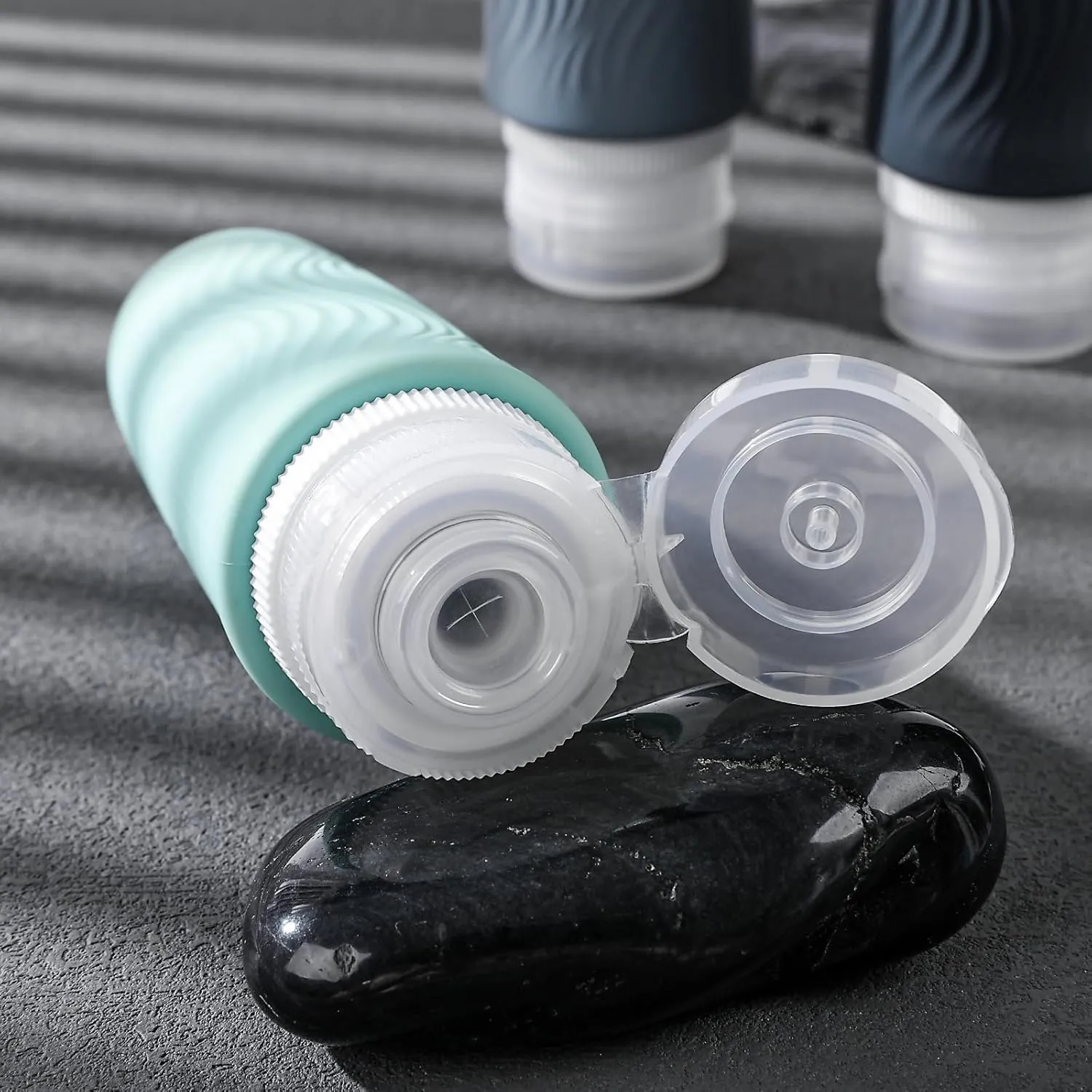Travel Bottles for Toiletries, TSA -Approved 3oz Portable Bottles, BPA-Free Leak Proof Squeezable Silicone Size Containers, Travel Accessories with Clear Toiletry Bag (4 Pack)